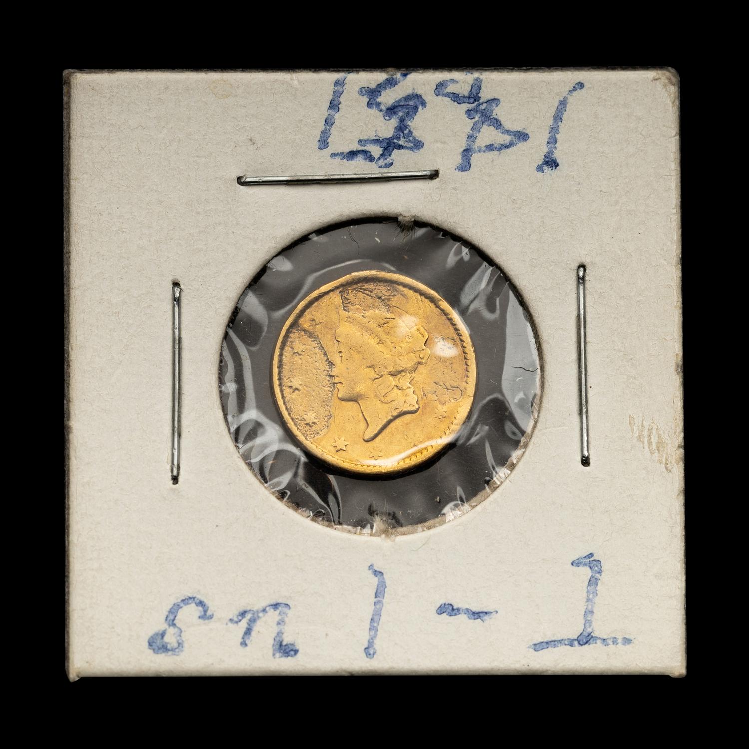 An 1851 Liberty Head $1 Gold Coin