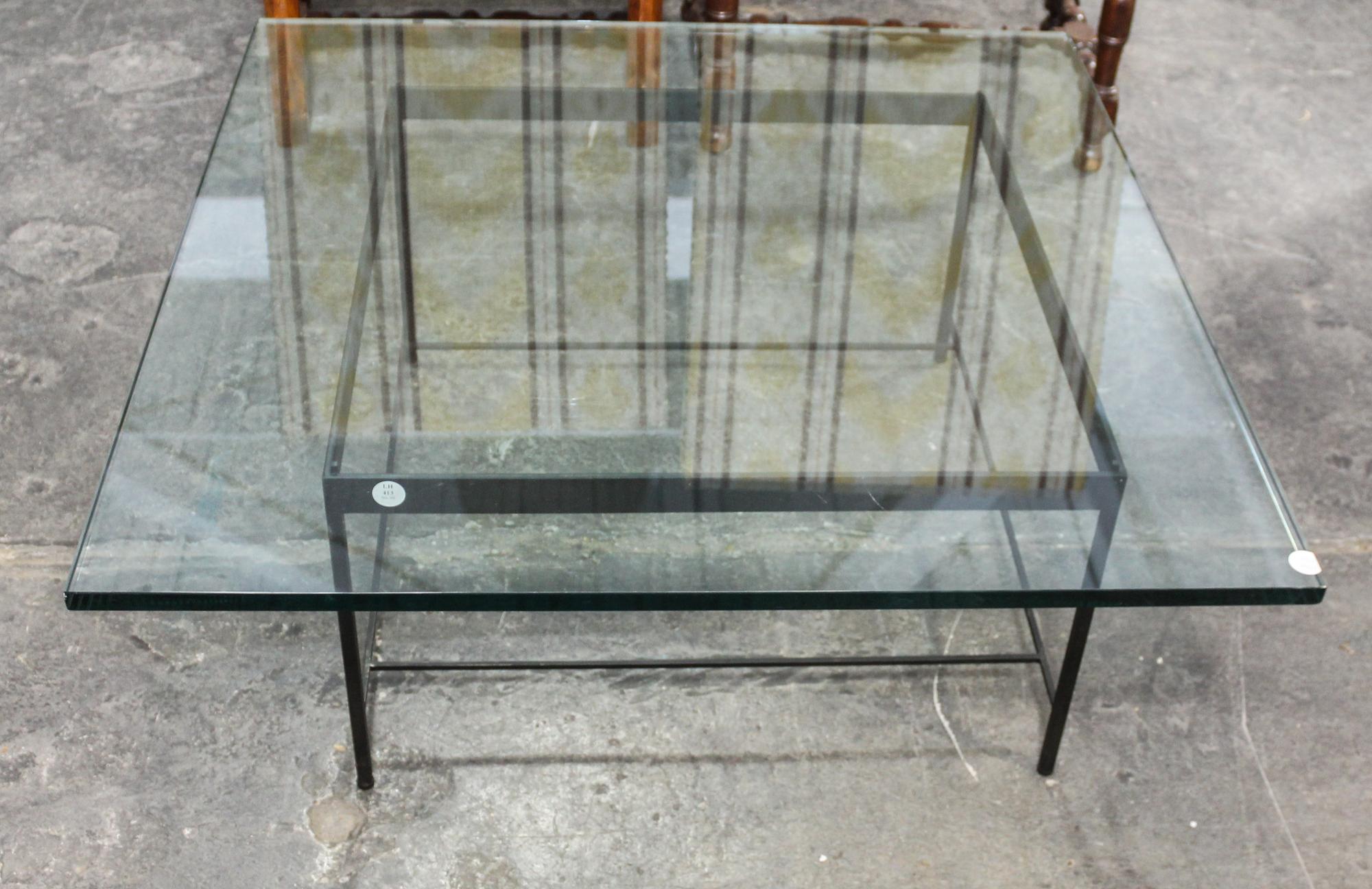 A Modern Metal and Glass Low Table. Height of base 14 inches