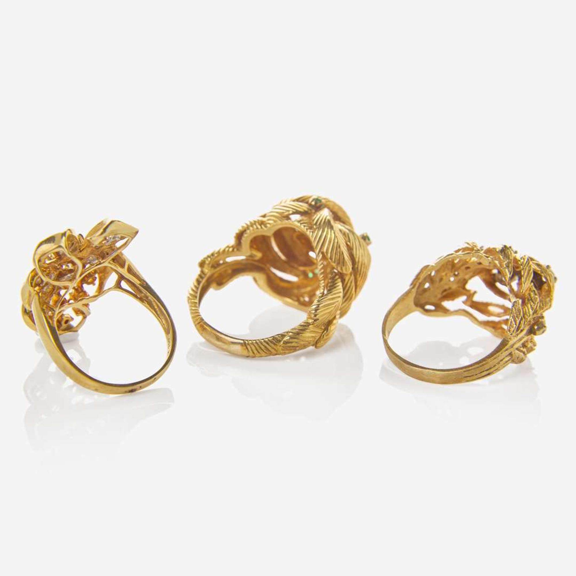 A Collection of Three Yellow Gold and Gemstone Rings