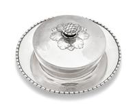 A Georg Jensen Silver Covered Caviar Dish and Underplate