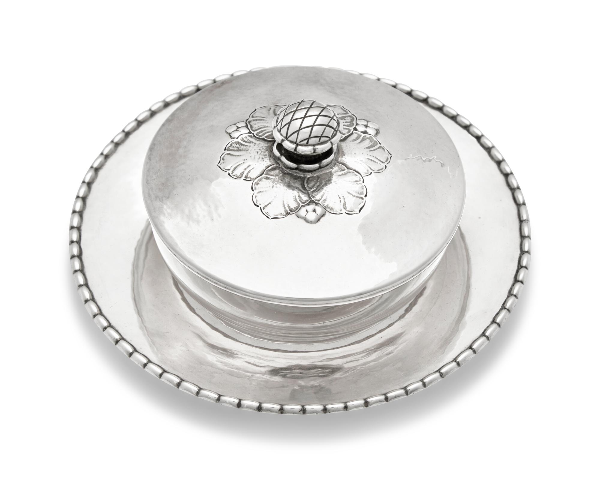 A Georg Jensen Silver Covered Caviar Dish and Underplate