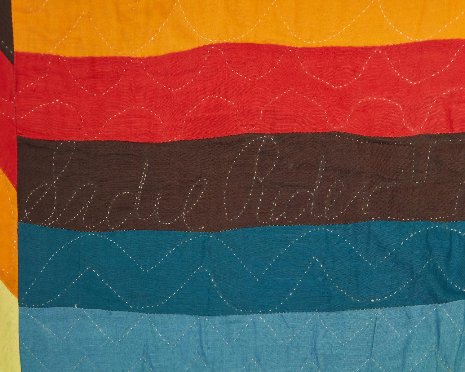 A Mennonite "Jacob's Coat" Cotton Quilt, Signed "Sadie Rader," 20th Century