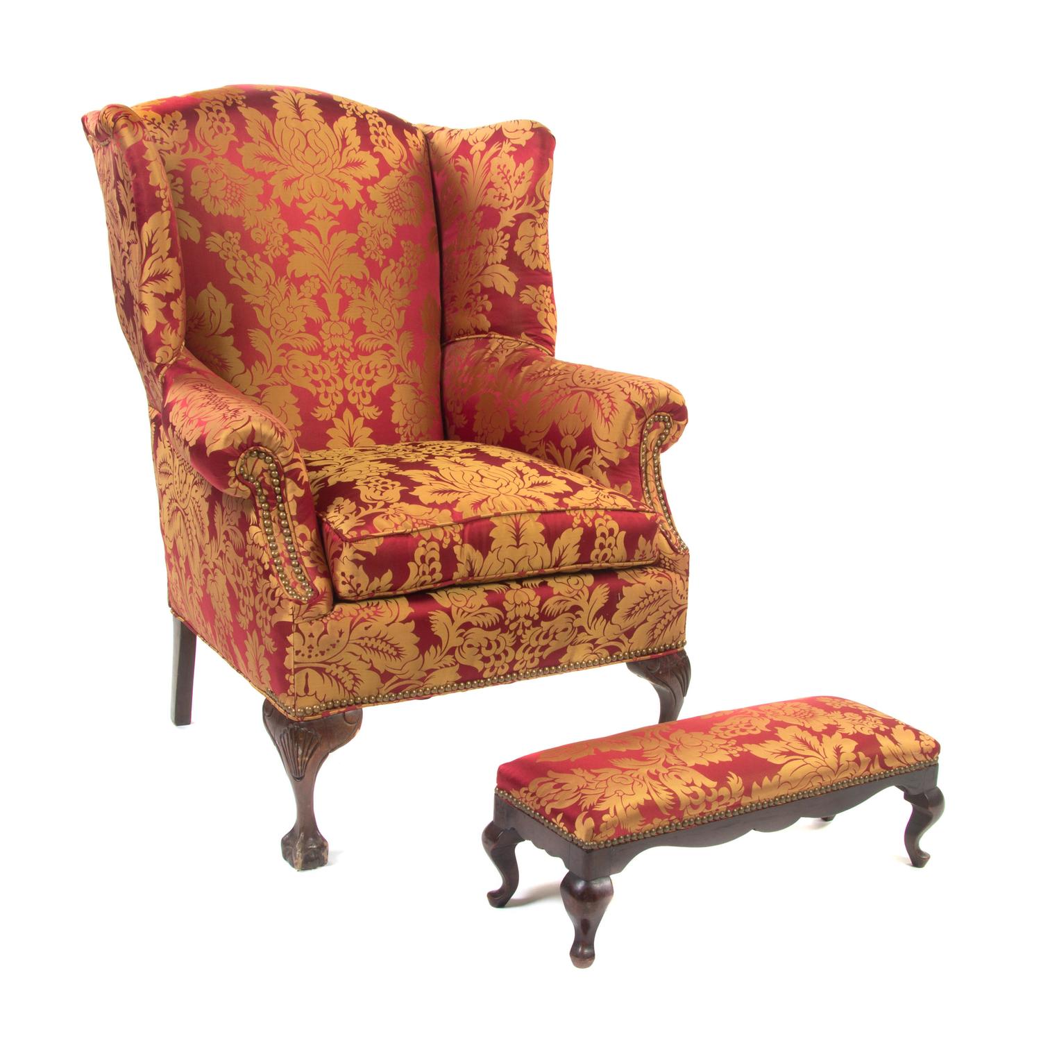 A Georgian Style Wingback Armchair, Height 38 1/2 inches.