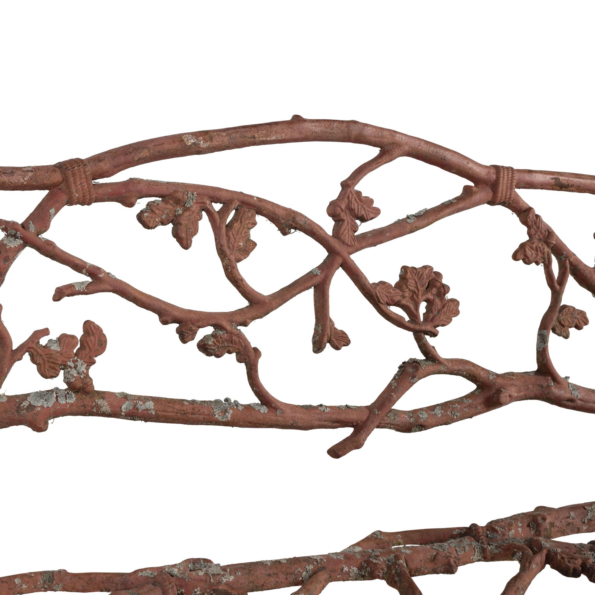 A Victorian Patinated Iron "Rustic" Garden Bench