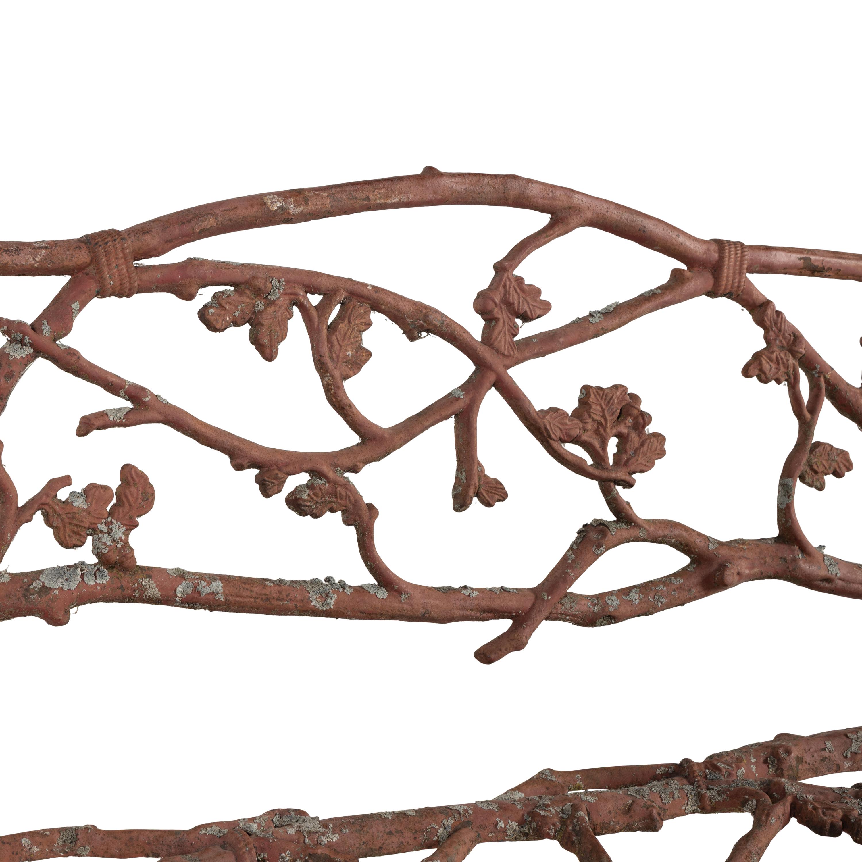 A Victorian Patinated Iron "Rustic" Garden Bench