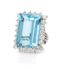 A 14 Karat White Gold, Aquamarine and Diamond Ring, 9.90 dwts.