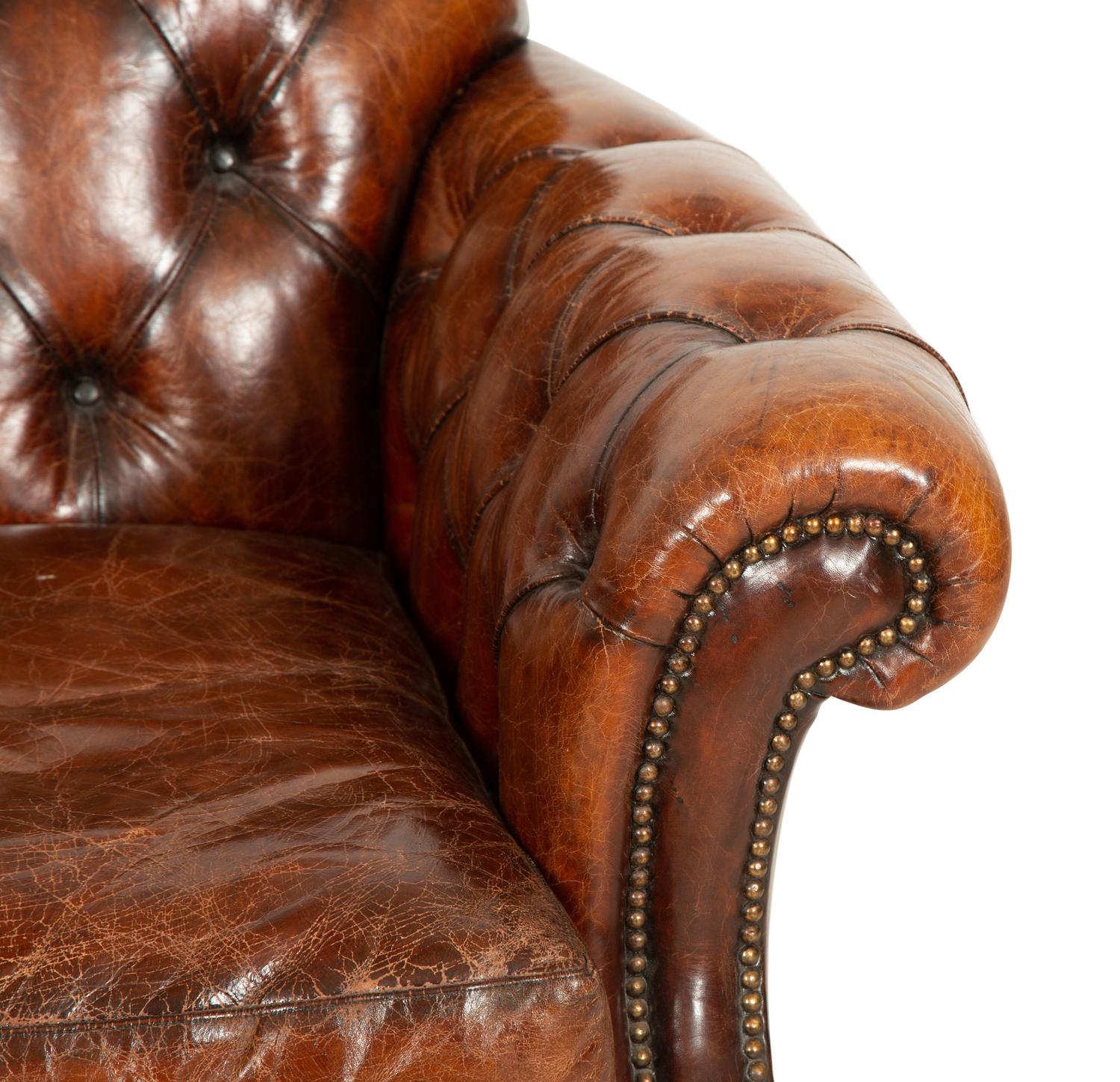 A Pair of Chesterfield Style Leather Club Chairs