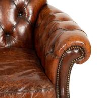 A Pair of Chesterfield Style Leather Club Chairs