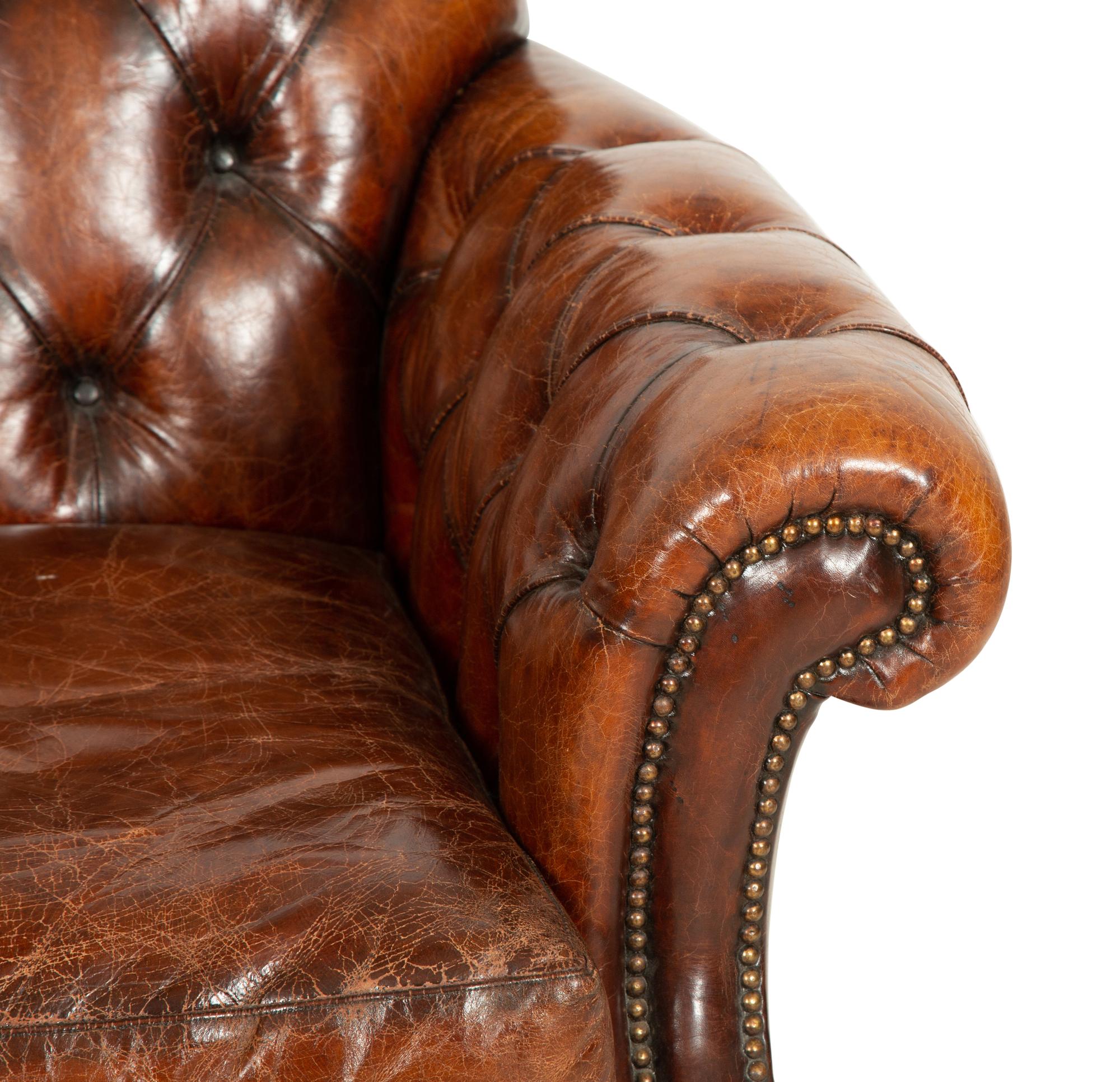 A Pair of Chesterfield Style Leather Club Chairs
