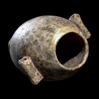An Egyptian Green Gray Breccia Vessel with Lug Handles
