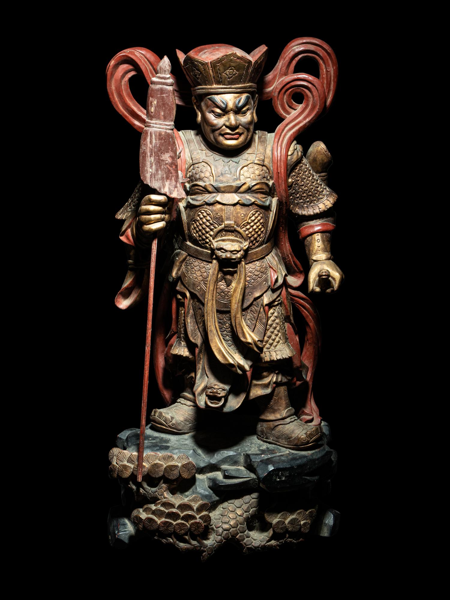 A Set of Four Gilt and Red Lacquered Wood Figures of Guardians