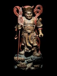 A Set of Four Gilt and Red Lacquered Wood Figures of Guardians