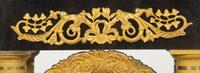 A Charles X Gilt Bronze Mounted Ebonized Portico Clock
