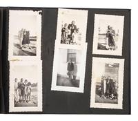 [EARLY PHOTOGRAPHY]. Album containing photos of a multi-generational African American family in Washington, DC. Ca early-to-mid 20th Century.