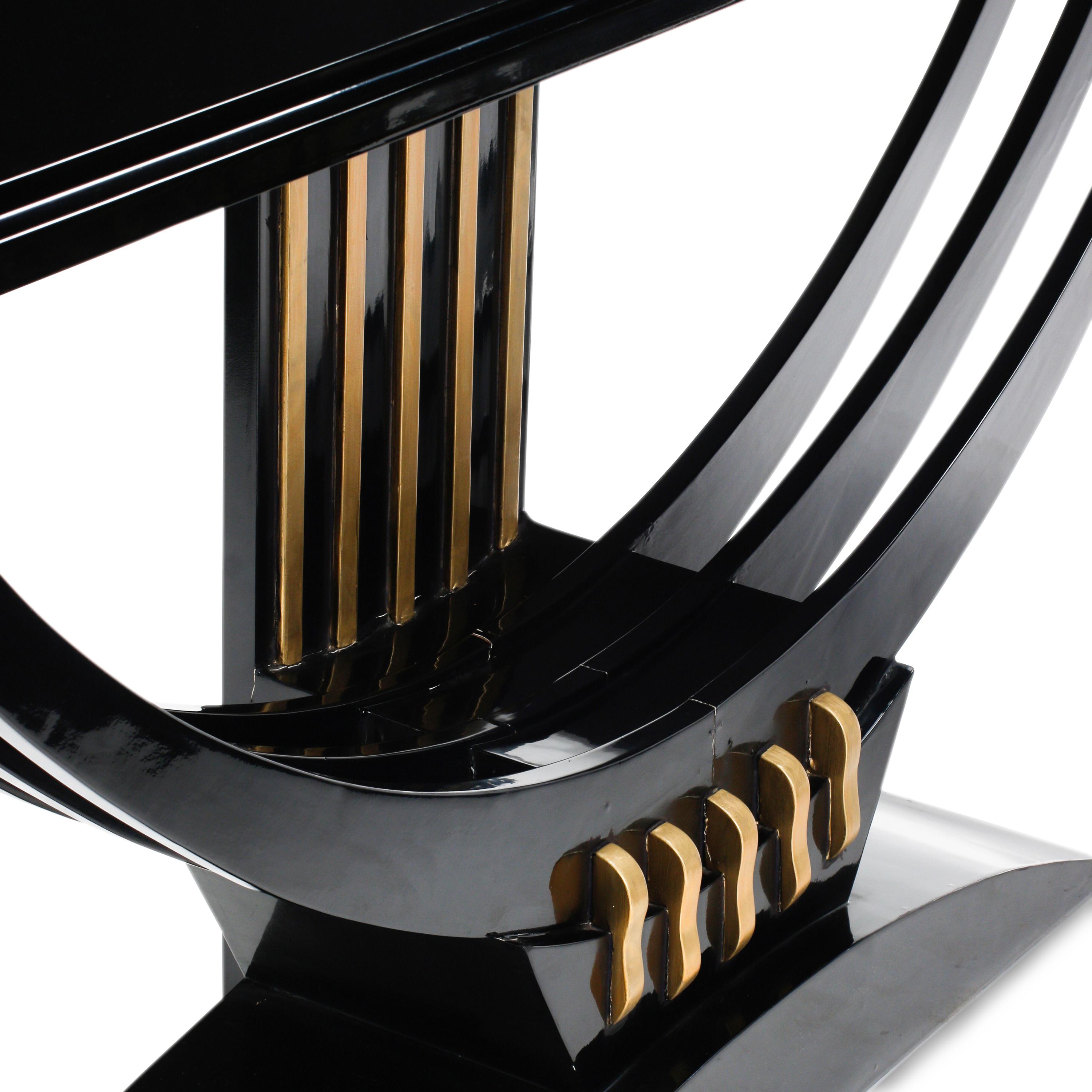 A Pair of Art Deco Style Black Lacquered and Parcel Gilt Console Tables