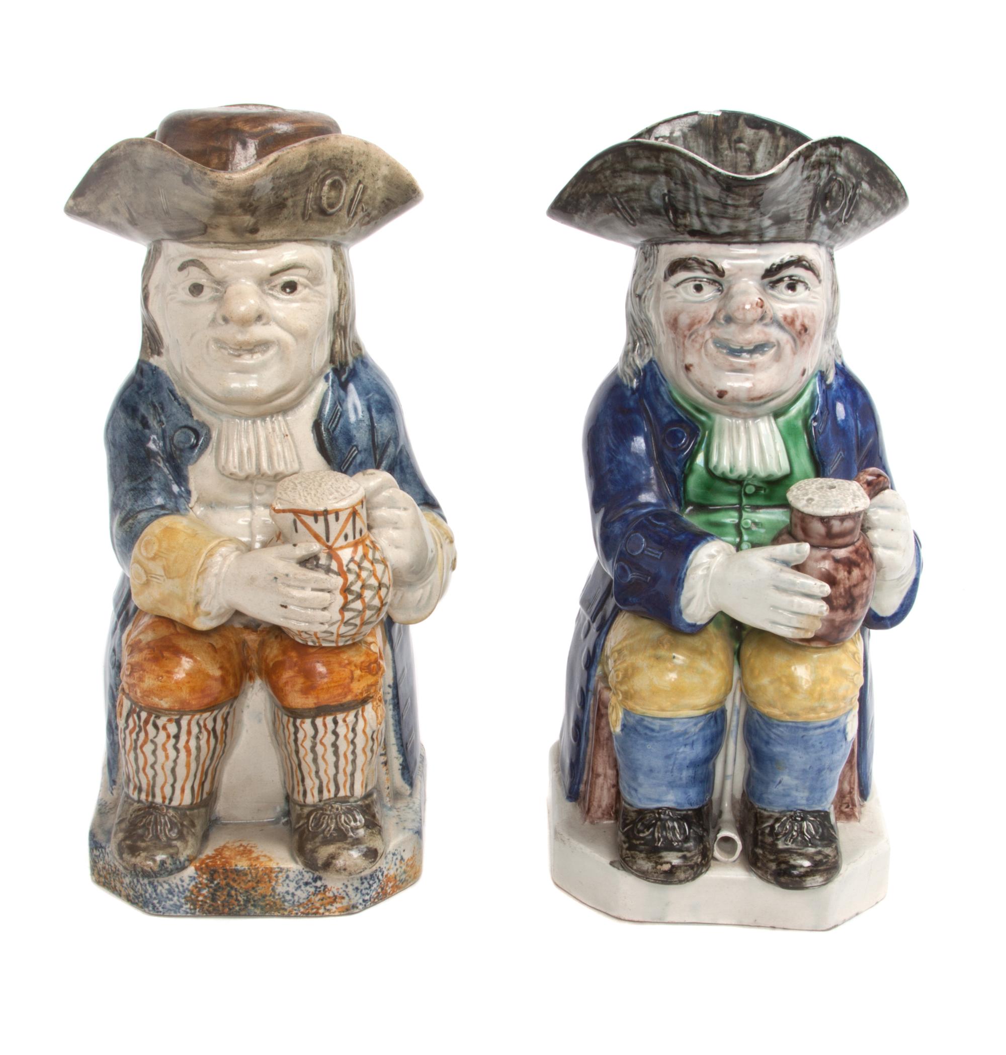 Two English Staffordshire Toby Mugs Height of each 10 inches.