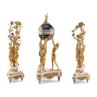 A Louis XVI Style Gilt-Bronze and White Marble Annular Clock Garniture