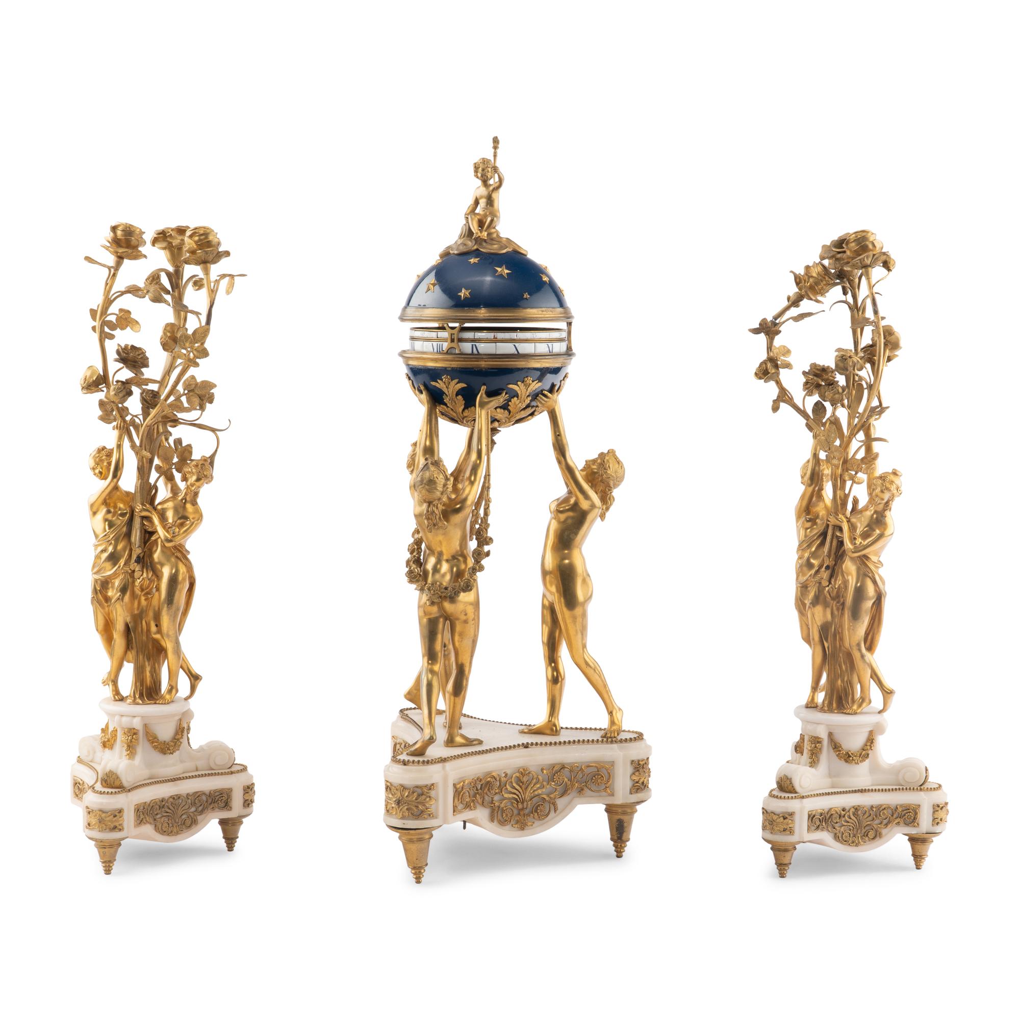 A Louis XVI Style Gilt-Bronze and White Marble Annular Clock Garniture