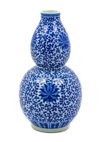 A Chinese Blue and White Porcelain Gourd Form Vase