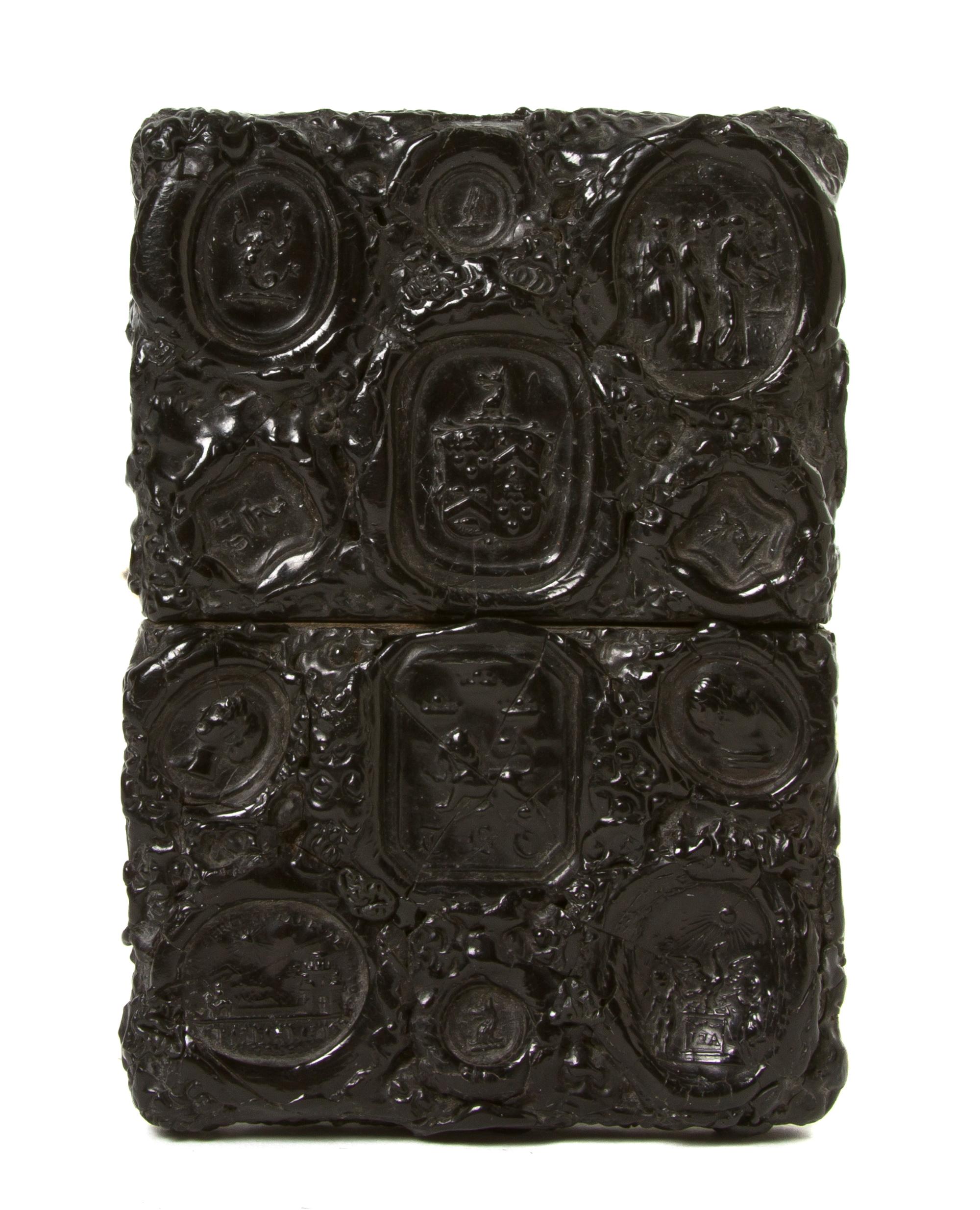 A Tooled Leather Card Case, Height 4 inches.