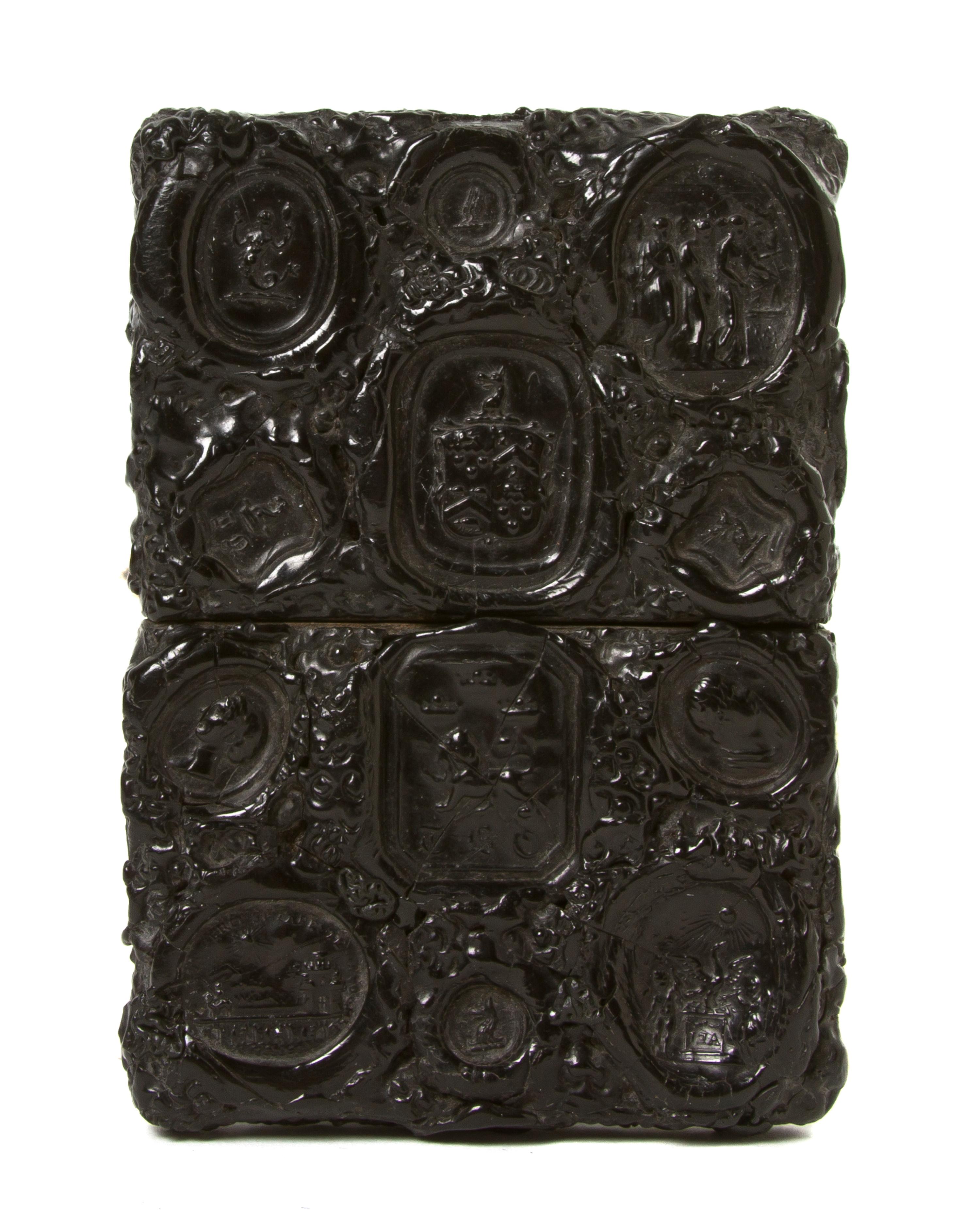 A Tooled Leather Card Case, Height 4 inches.