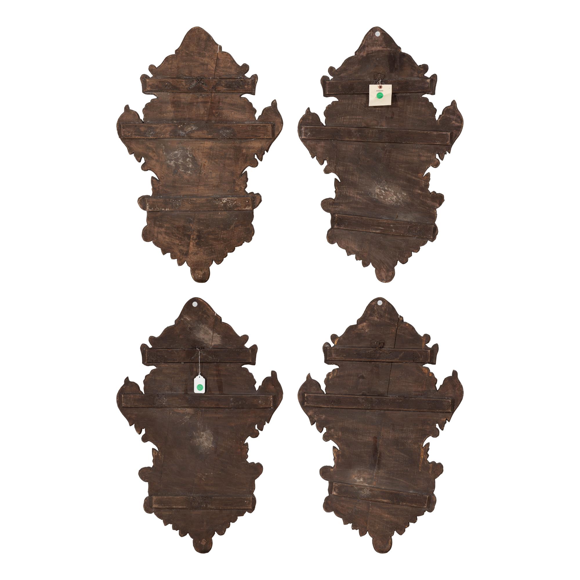 A Set of Four Italian Painted Cartouche-Form Plaques