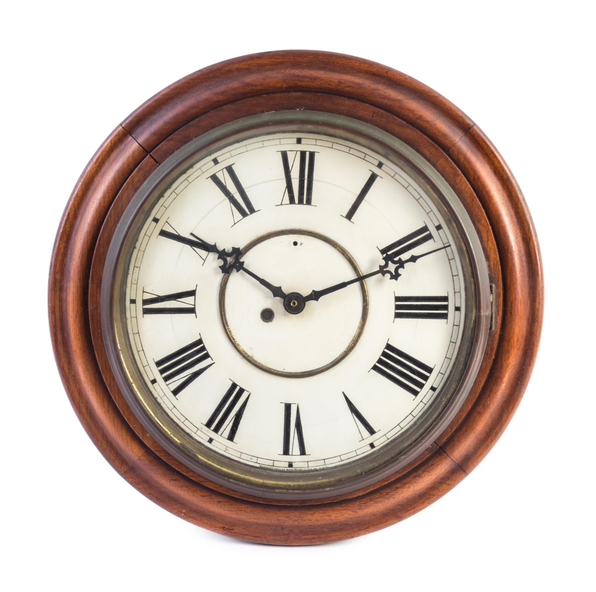An English Wall Clock Diameter 18 inches. — 19TH/20TH CENTURY