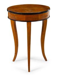A Biedermeier Parcel Ebonized Occasional Table