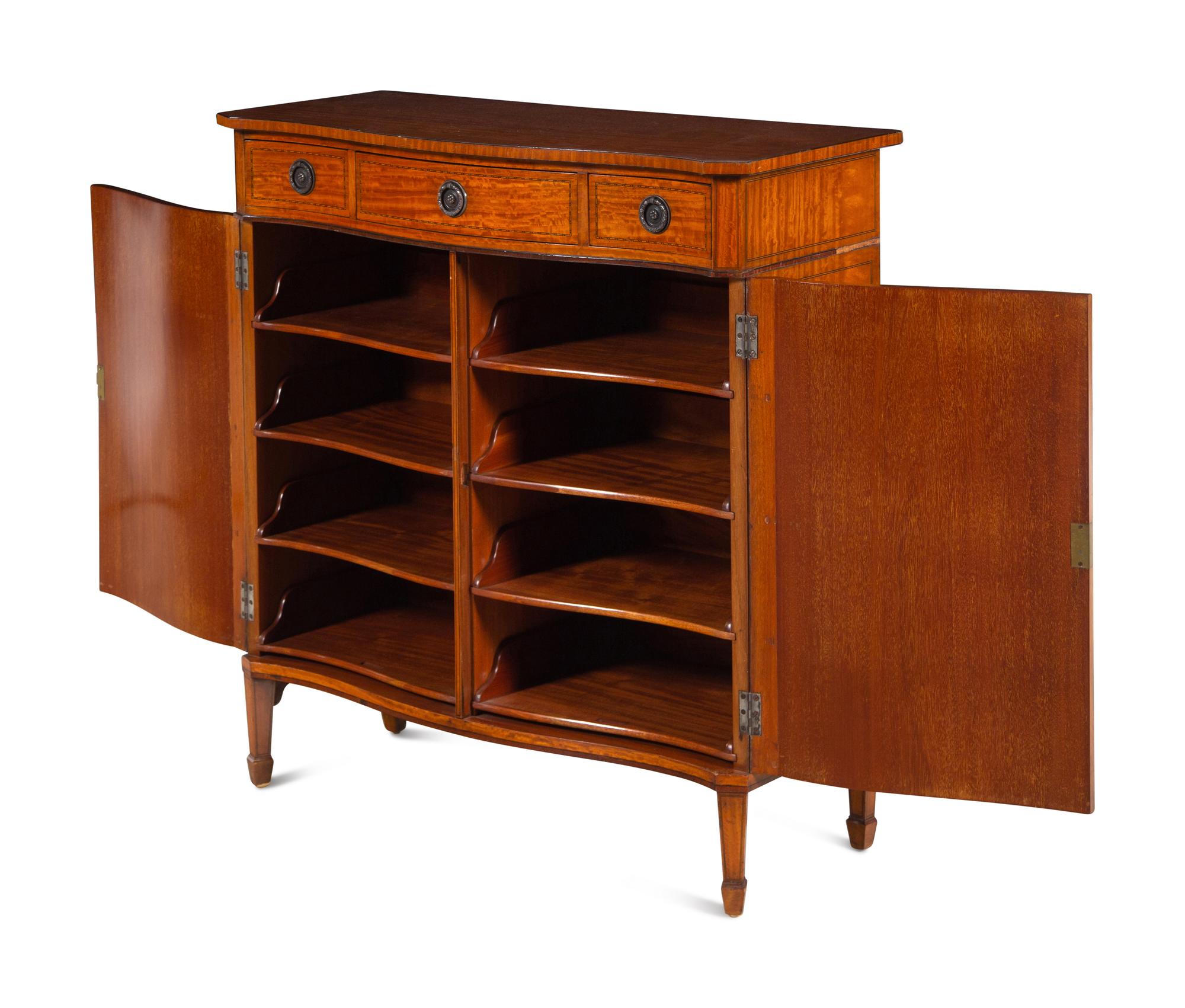 A George III Style Satinwood Serpentine Cabinet