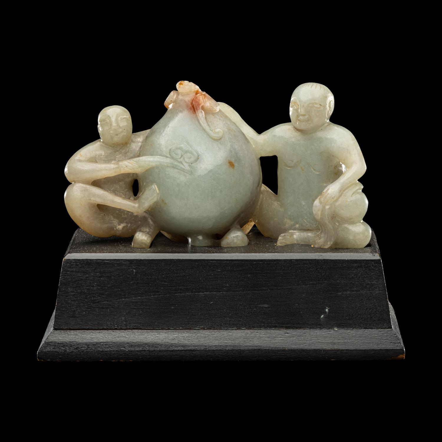 A Chinese Green Jadeite Figural Group of Monkeys and Peach