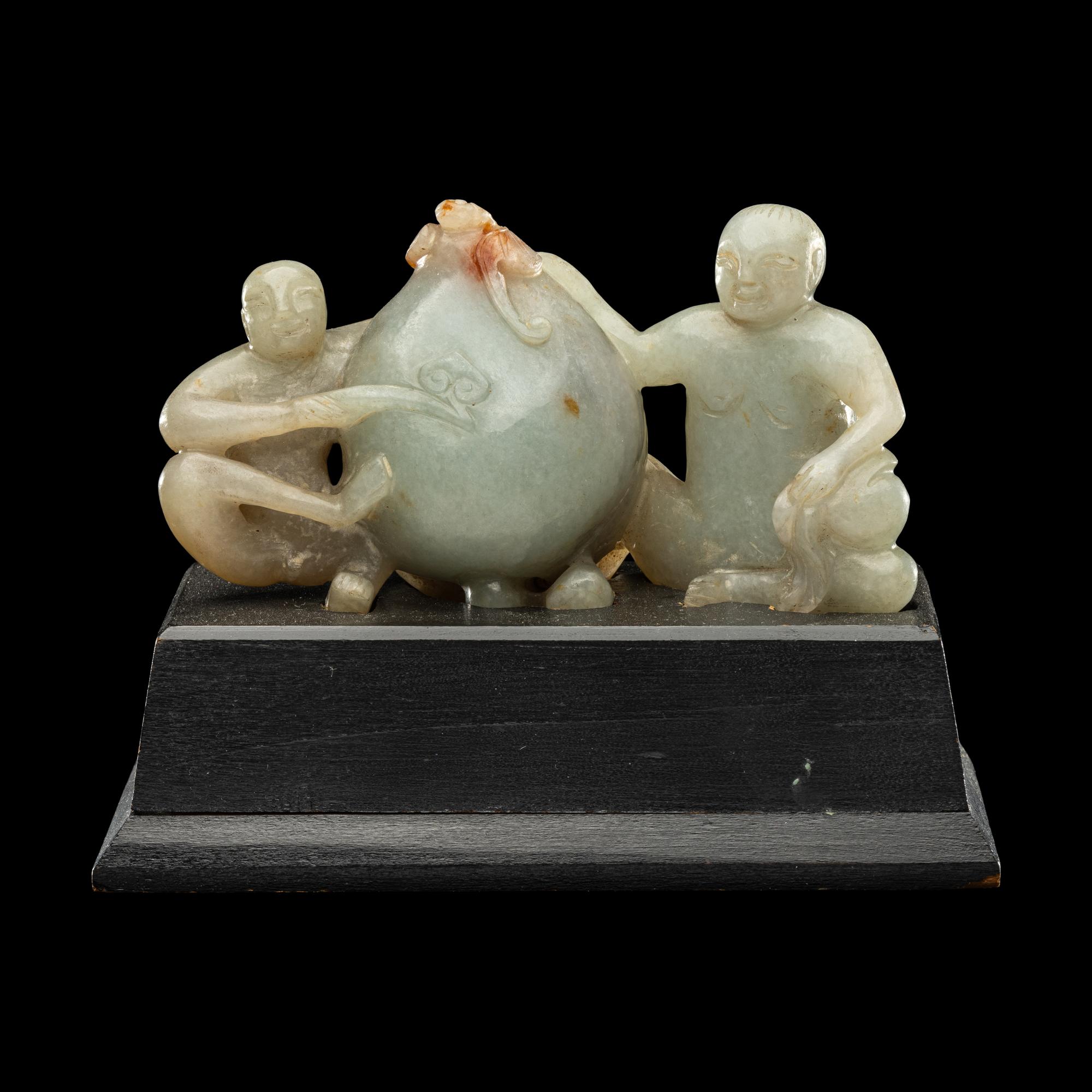 A Chinese Green Jadeite Figural Group of Monkeys and Peach