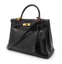 An Hermes 35cm Black Leather Kelly Bag, 14 x 8 x 7 inches.