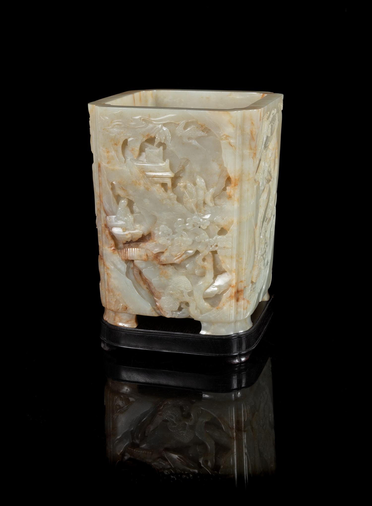 A Pale Celadon and Russet Jade Brushpot, Bitong Height 6 3/8 inches. — 19TH CENTURY