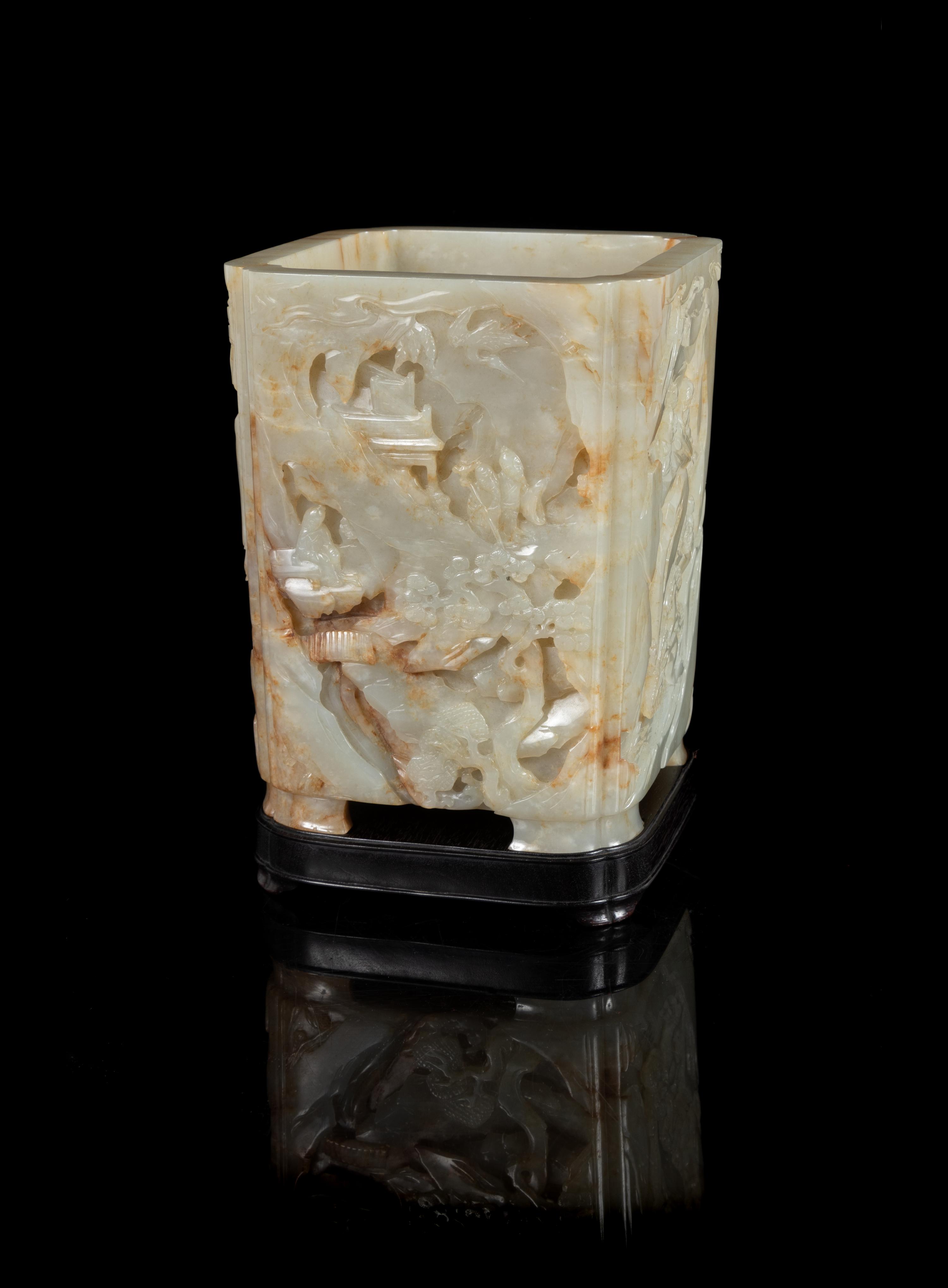 A Pale Celadon and Russet Jade Brushpot, Bitong Height 6 3/8 inches. — 19TH CENTURY