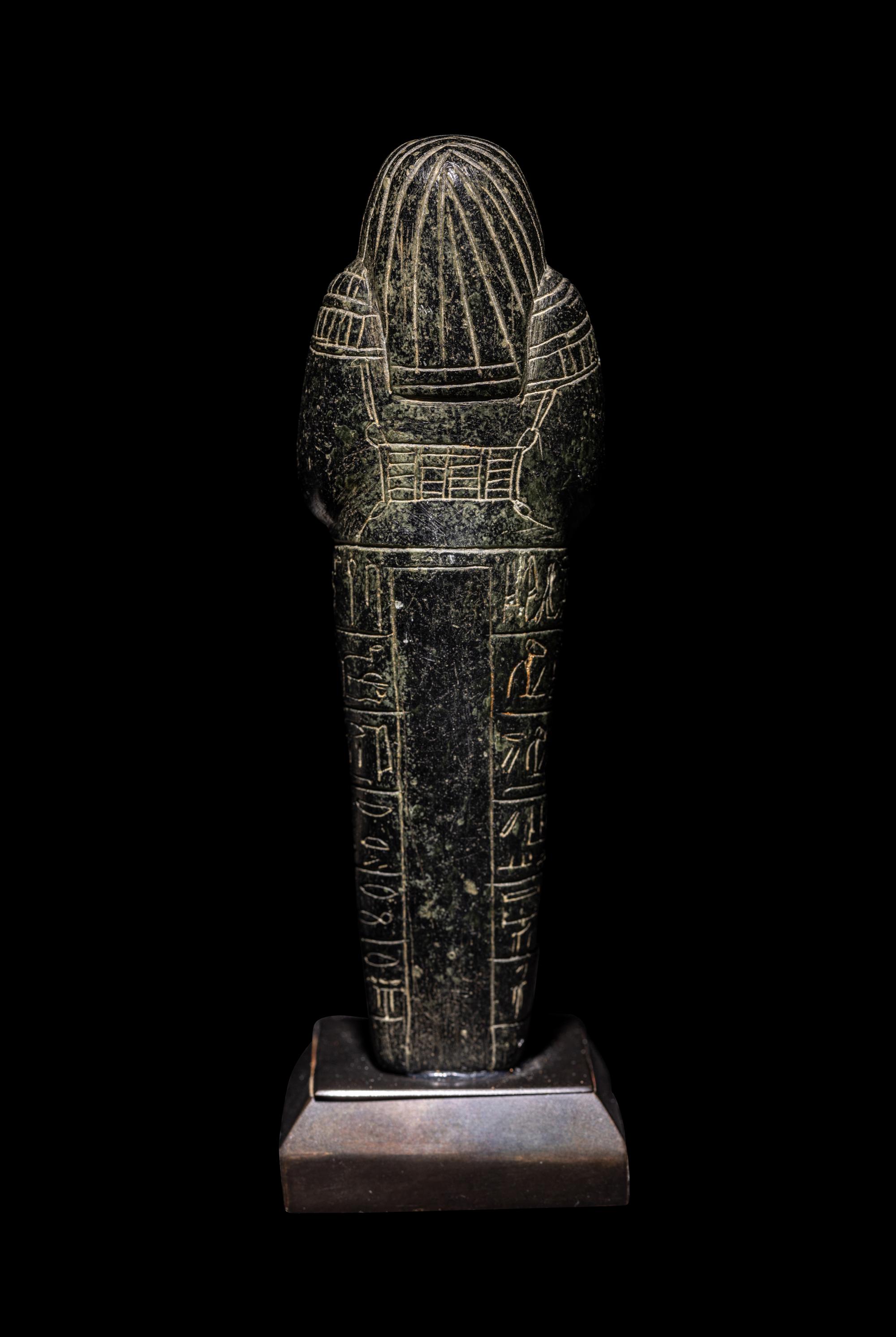 An Egyptian Serpentine Ushabti for May
