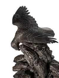 A Japanese Bronze Figural Group of a Hawk Hunting Monkeys
