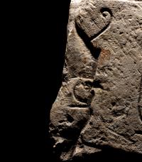 An Egyptian Limestone Relief Fragment with Cartouche of Ramesses II