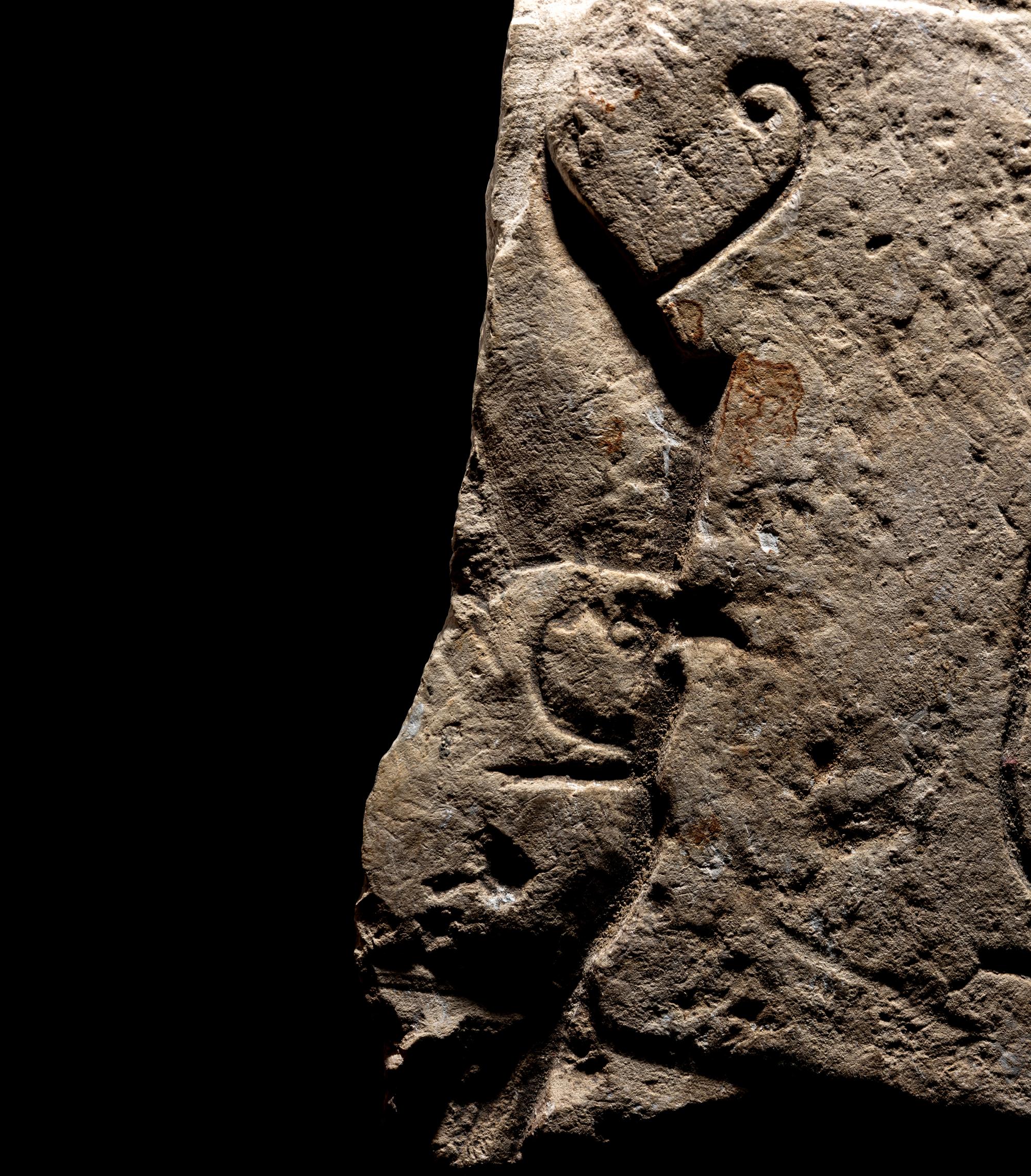 An Egyptian Limestone Relief Fragment with Cartouche of Ramesses II