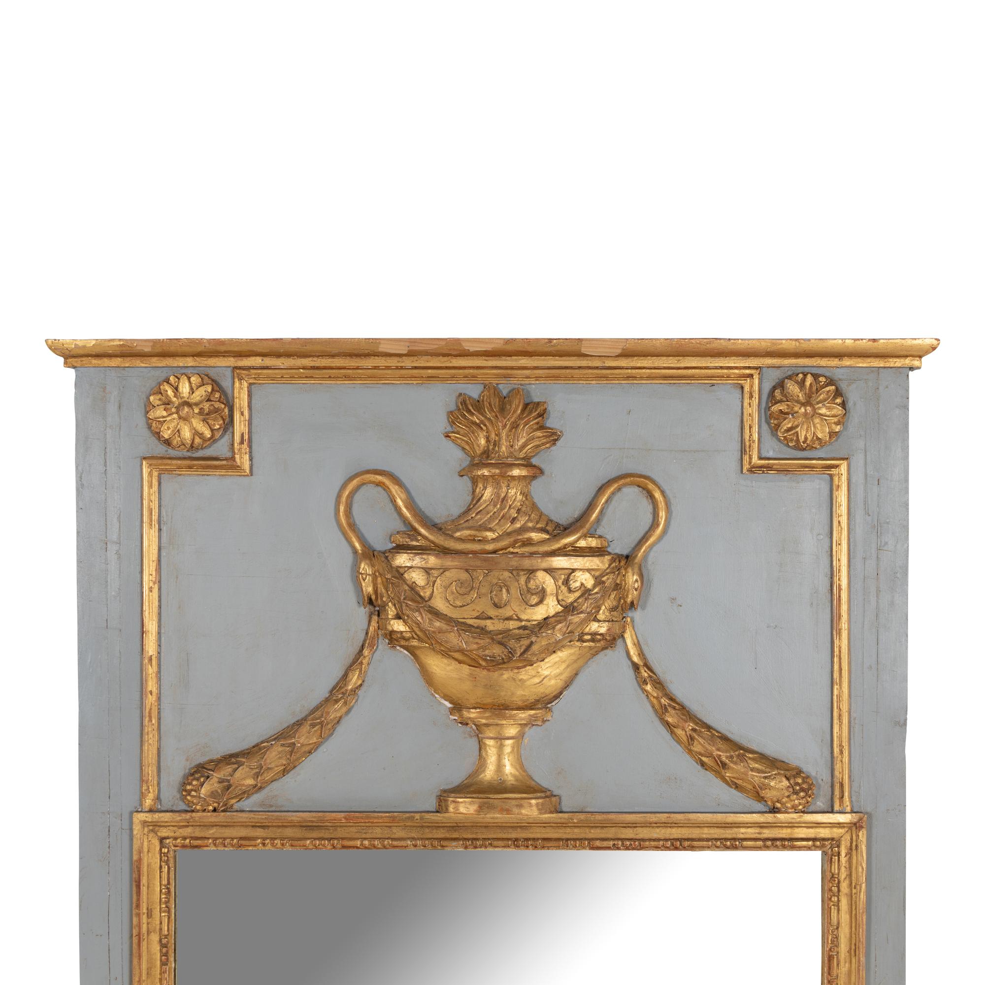 A Louis XVI Style Grey-Painted and Parcel Gilt Trumeau Mirror