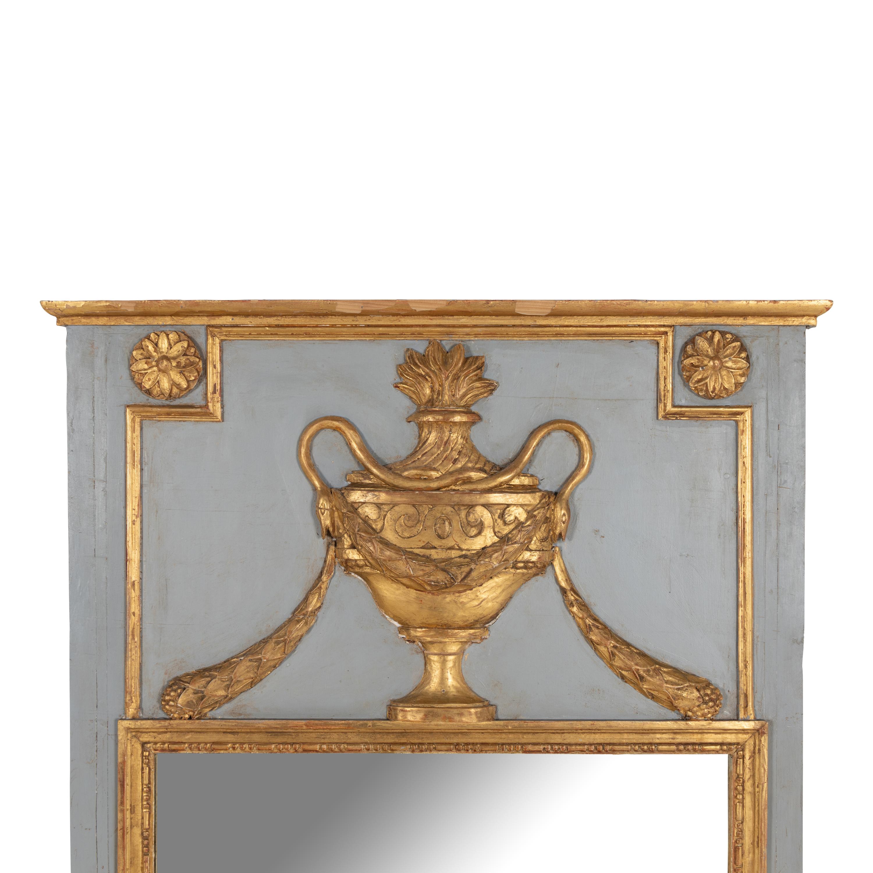 A Louis XVI Style Grey-Painted and Parcel Gilt Trumeau Mirror