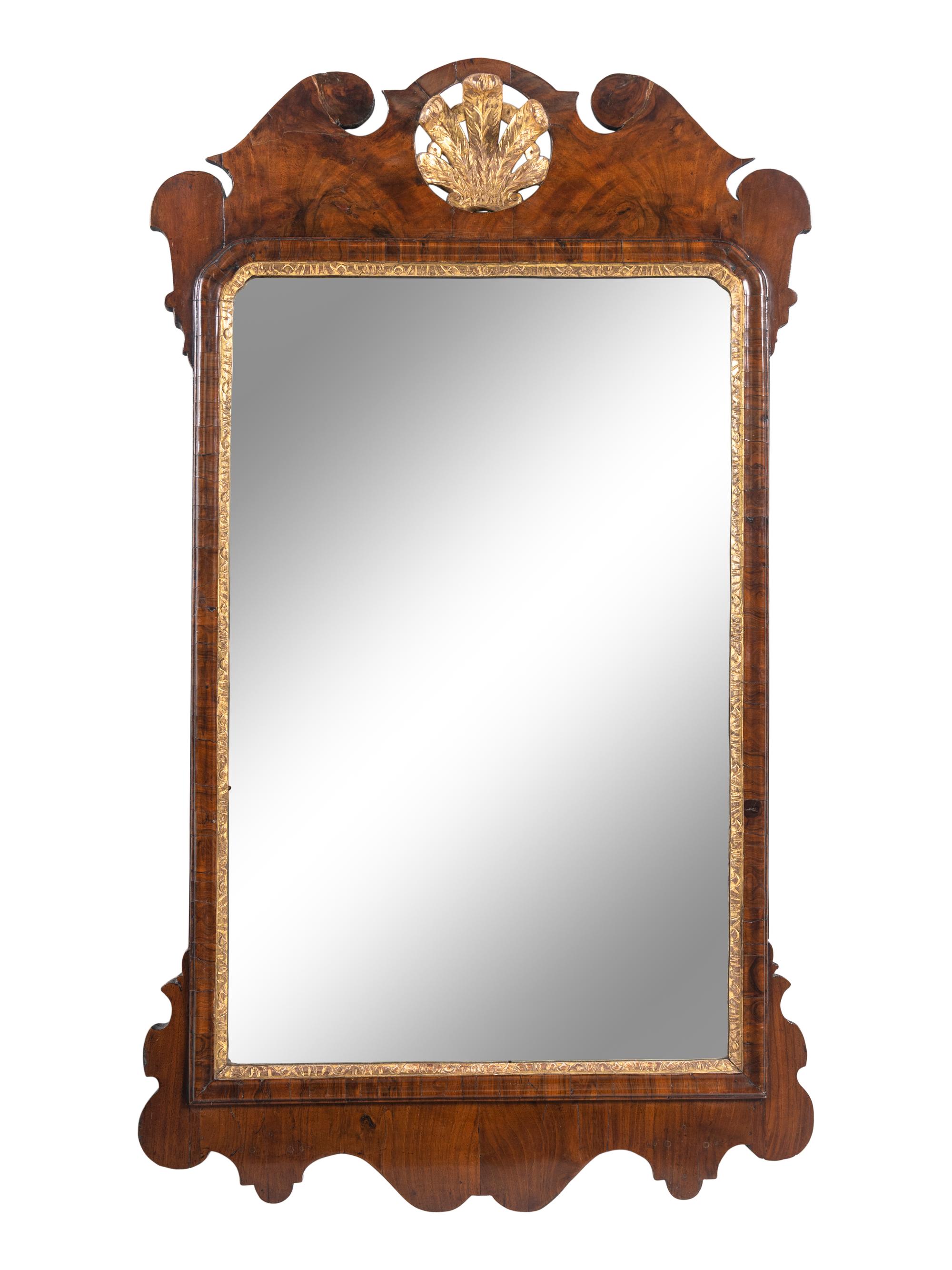 A George III Parcel-Gilt Mahogany Mirror