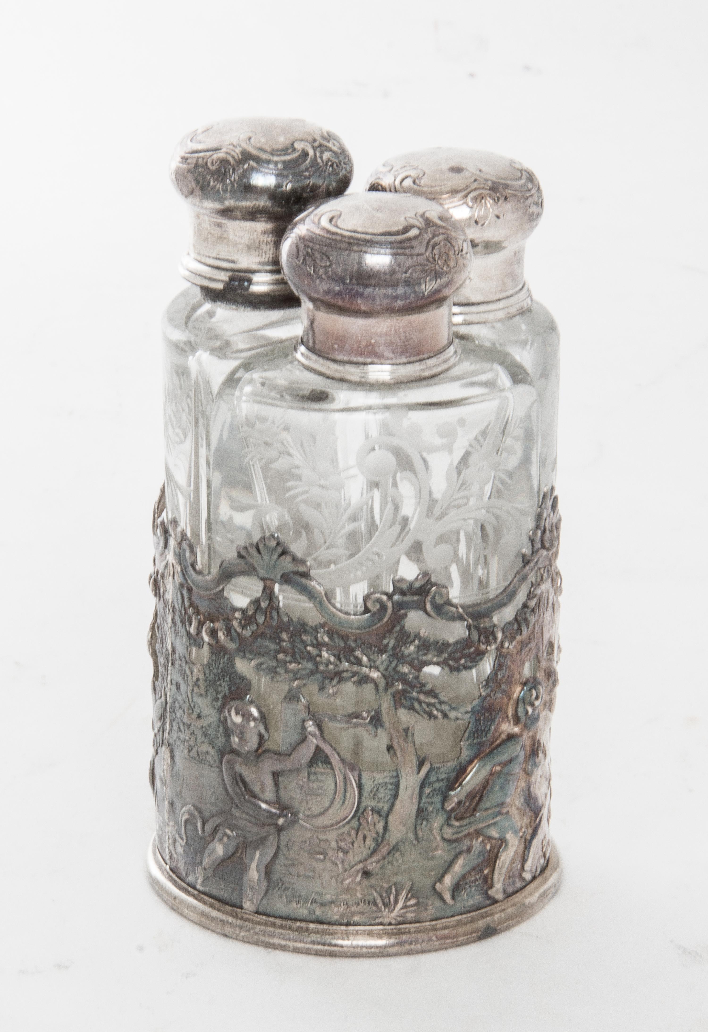 A German Silver and Glass Perfume Set Height 4 1/2 inches.