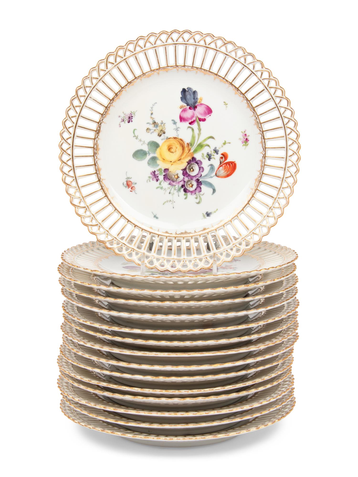 A Set of Fifteen Dresden Porcelain Reticulated Dessert Plates
