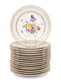 A Set of Fifteen Dresden Porcelain Reticulated Dessert Plates