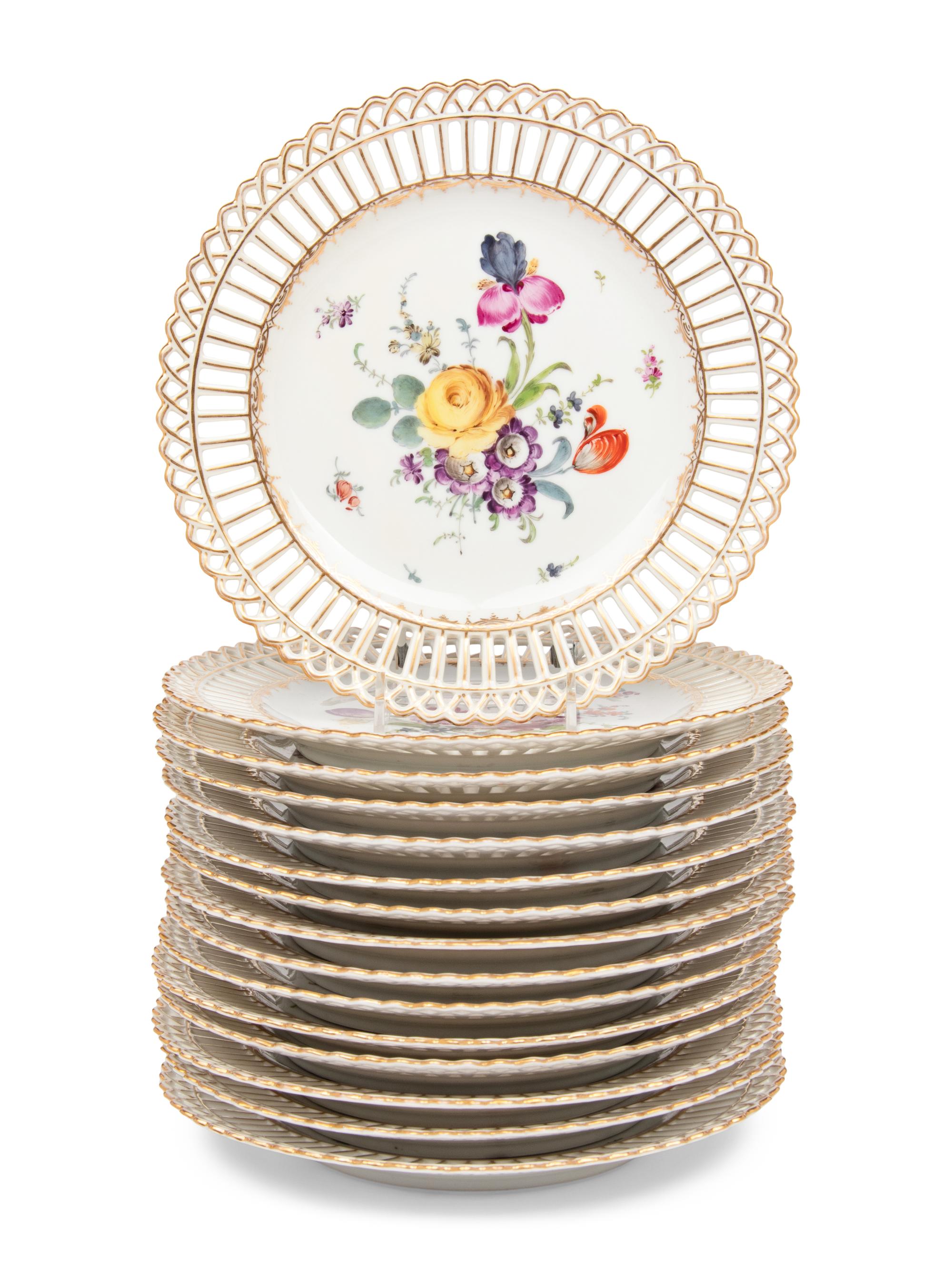 A Set of Fifteen Dresden Porcelain Reticulated Dessert Plates