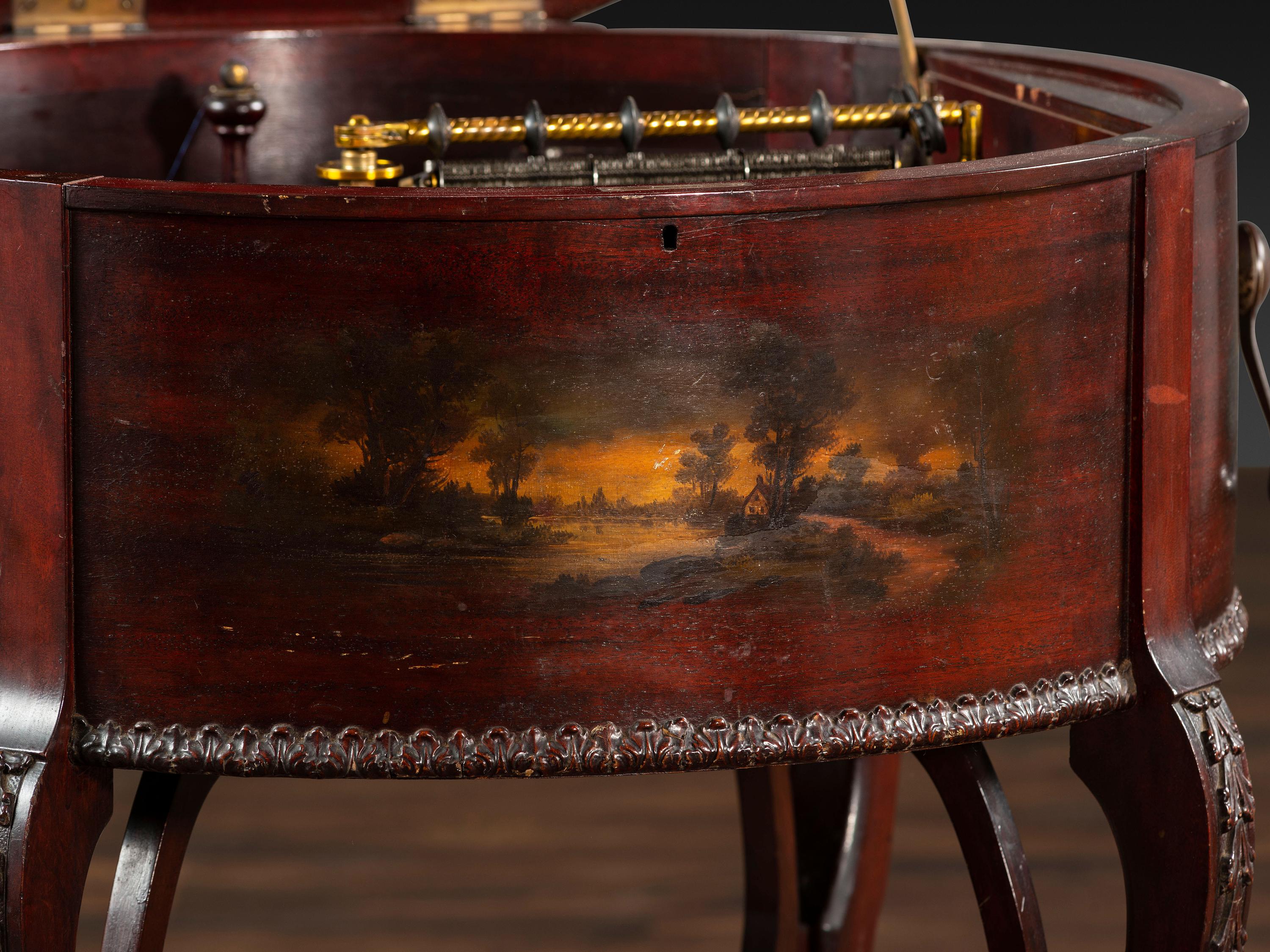 A Regina 'Rookwood ' Paint Decorated 20 Inch Drum Music Box