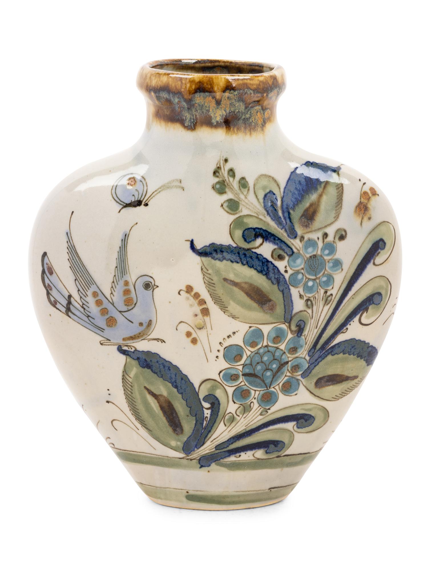 A Mexican Glazed Terra Cotta Vase