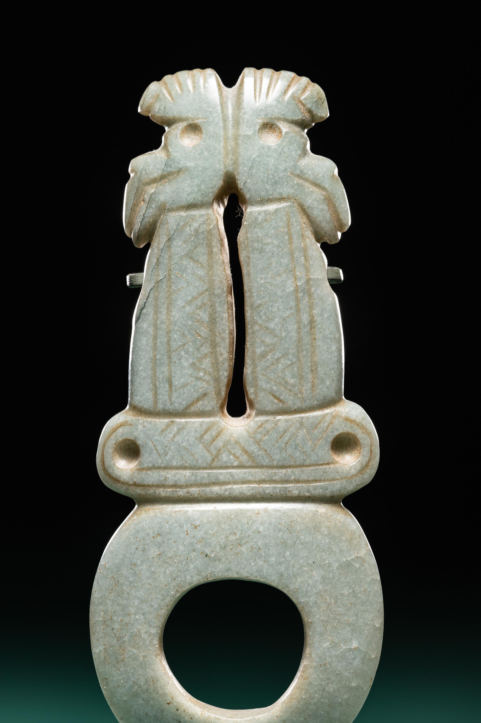 A Costa Rican Green Jade Double Avian Pendant
