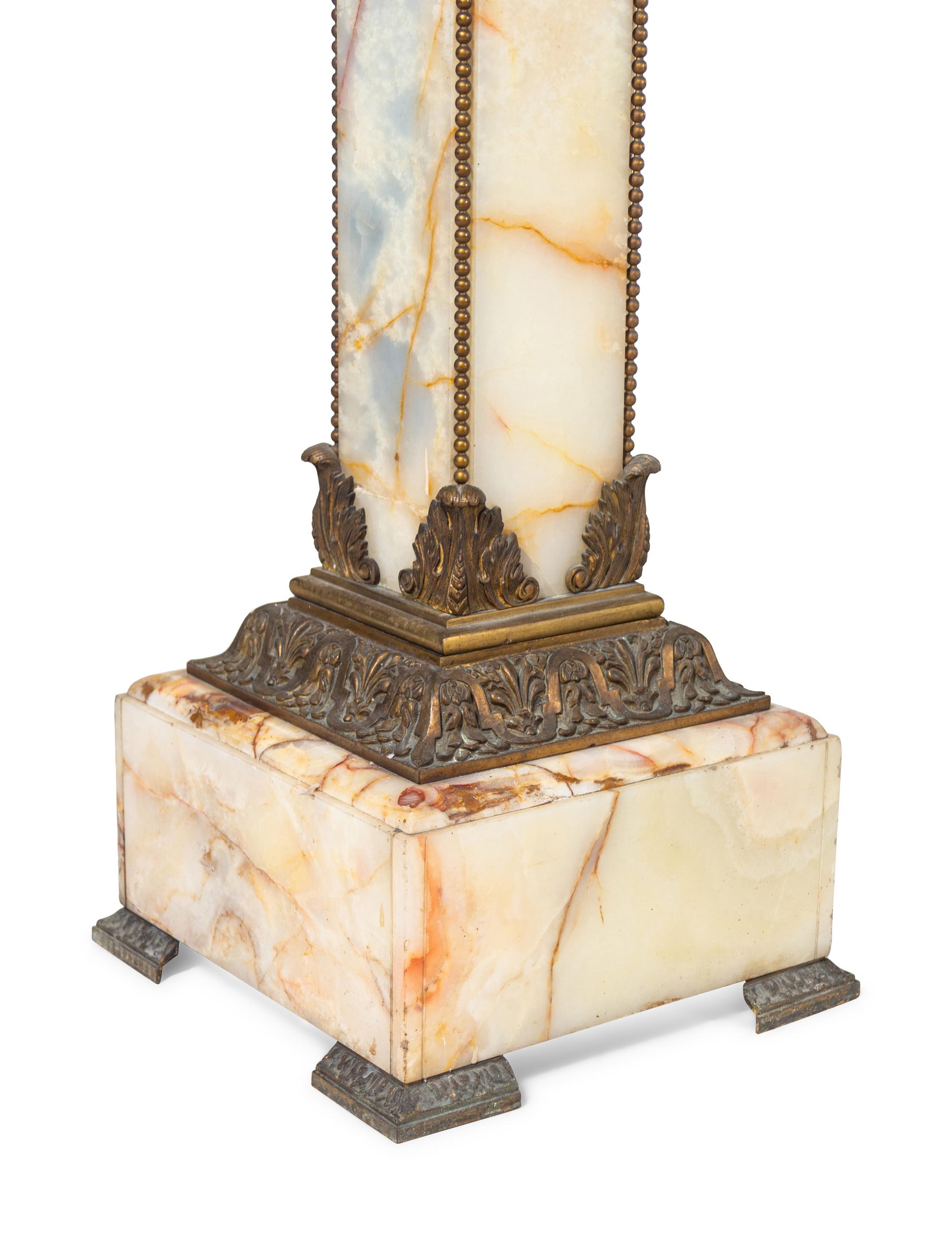 A Neoclassical Gilt Bronze Mounted Onyx Pedestal