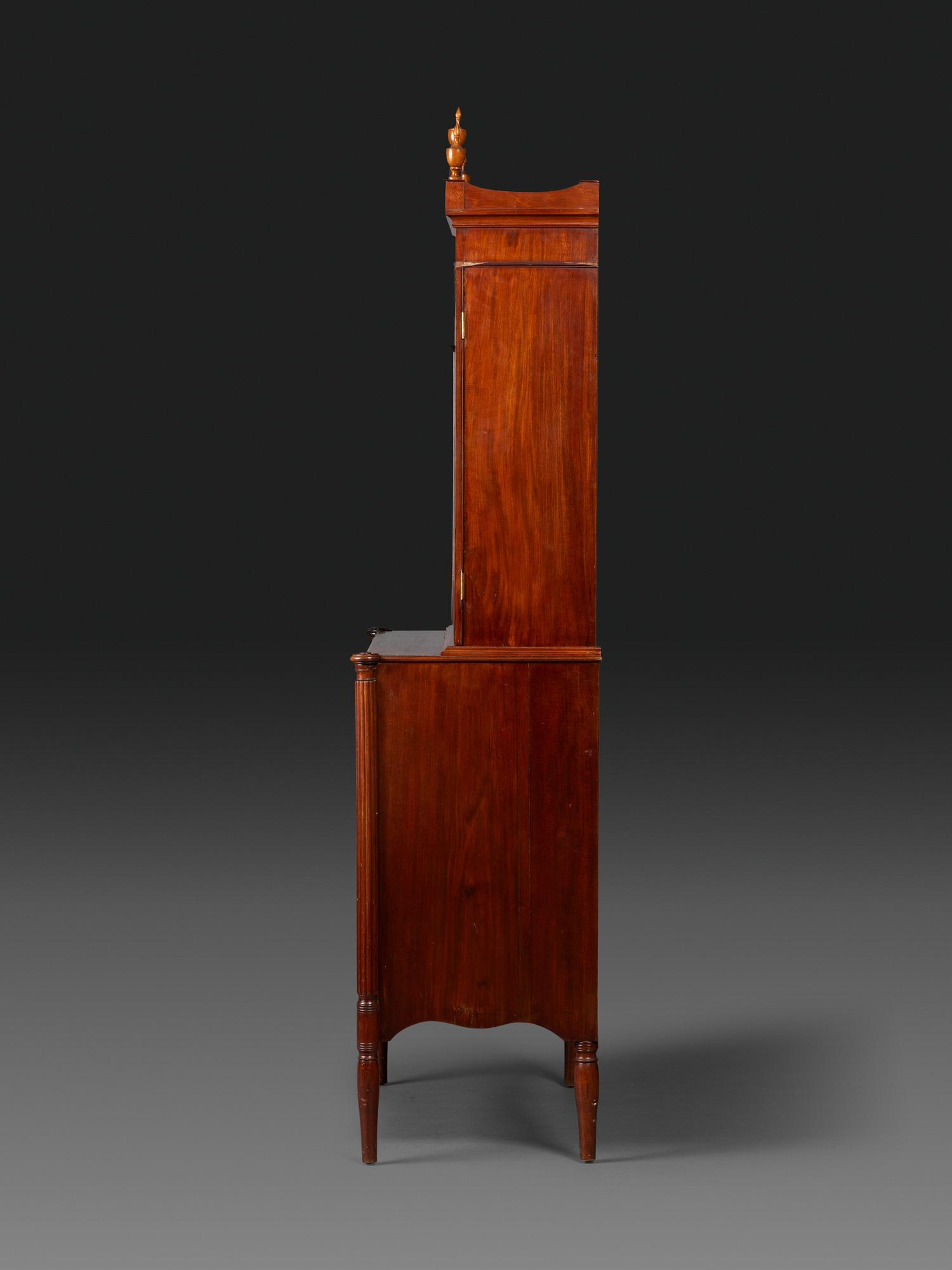 A Federal Mahogany and Figured Maple Secretary Bookcase